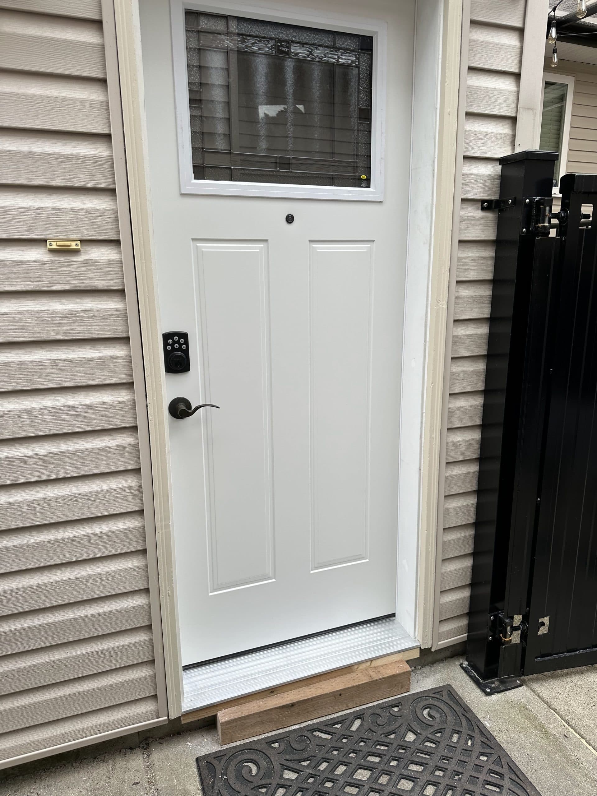 Exterior door after — new door installed