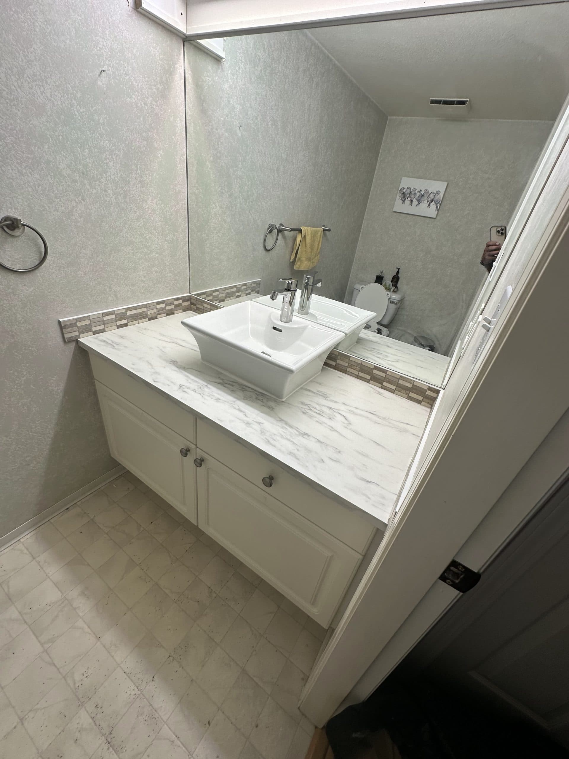 Bathroom after — new fixtures